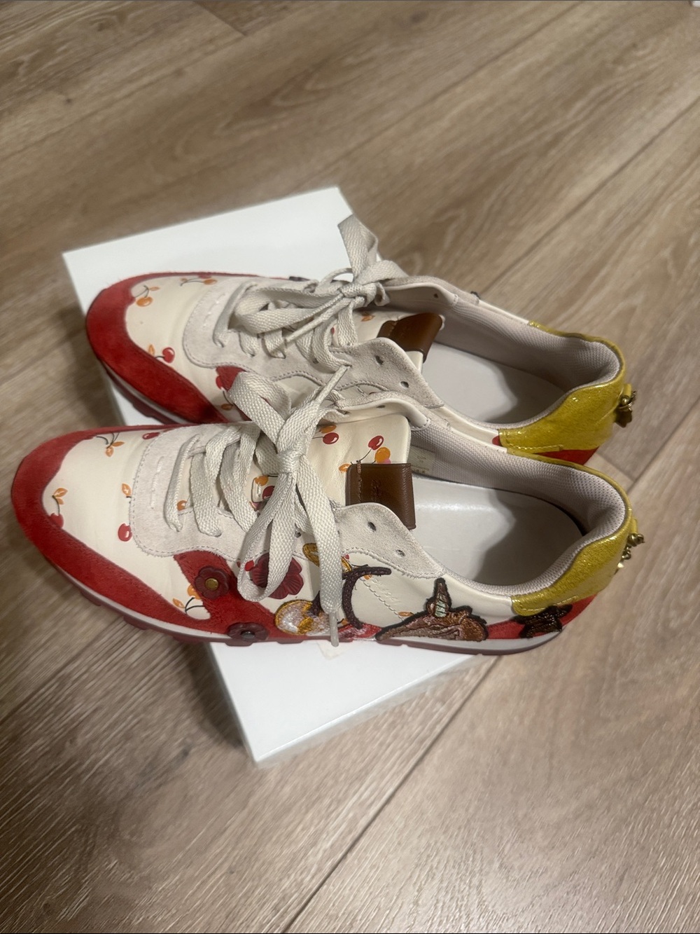 Coach Cream Sneakers with Red Cherry Accent and Yellow Heel